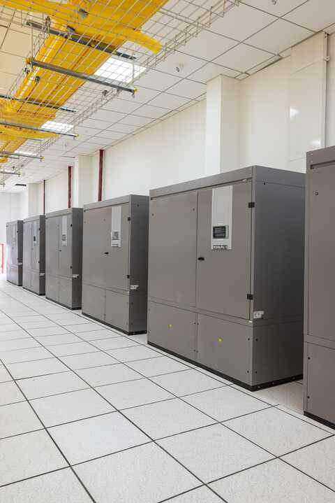 Precision cooling units lining a corridor at Silvernox